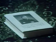 The back of the book includes a photo and biography of William Loomis