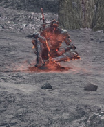 The Soul of Cinder resting at the bonfire.