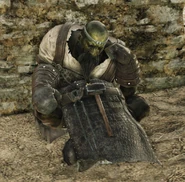 Lenigrast sitting dejected outside of his smithy