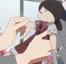  playing with the baby doll in 