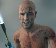 The Ripper with ACE torch that wounds Boozer at Crazy Willie's.