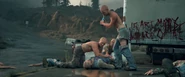 a group of Rippers attacking Boozer.