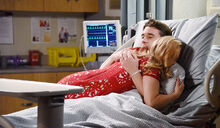 Chad-hugging-abby-hospital-bed-days-XJj