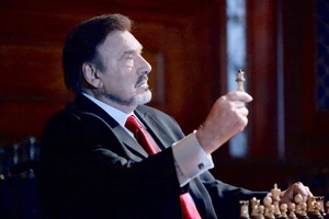 Stefano and The Queen Chess Piece.