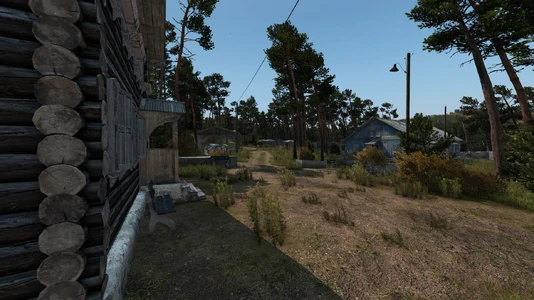 The lodge (left) and medical centre (right) upon entering the camp.