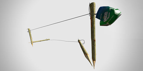 A tripwire deployed with an empty Soda Can