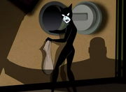 Chase Me Catwoman robbing the safe