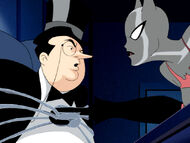 Batwoman interrogates Penguin