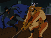 Batman fights an oddly clothed thug