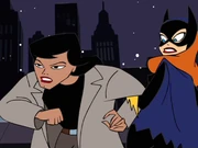 Batgirl holds back Renee