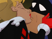 Harley kisses Batman