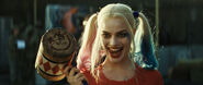 Harley Quinn holds a mallet