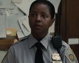 Sonja Crosby as Gotham Desk Cop