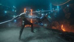 Orm kicks Arthur during their duel