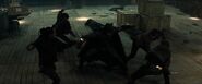 Batman battling Knyazev's men