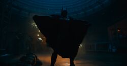 Batman protects from shots