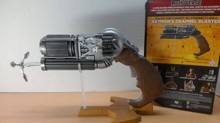 Batman's Grapnel Blaster - Pieces of blaster included with other characters, not sold separately