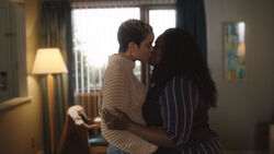 Keeya and Leota Adebayo kiss