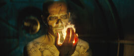 El Diablo holds fire in his hand