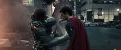 Zod beats up Superman