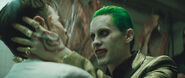 The Joker holds Griggs' head
