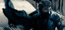 Faora boards the C-17