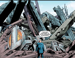 Luthor standing in front of the ruins of his old building