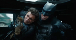 Batman punches Al Falcone