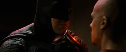Batman threatening Luthor