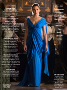 Diana Prince stands in a blue dress promotional still