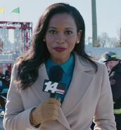 Nneka Elliott as Newscaster