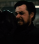 Anatolis Men - Warehouse K - shoots Batman.png (284 KB) Unknown actor as Anatoli's Henchman