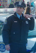 Michael Xavier as Carnival Cop
