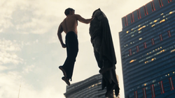 Justice League (2017) Superman holds Batman