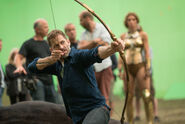 JL-BTS - Zack Snyder with amazon bow on set