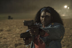 Leota using a Gun - Its Cow or Never Promo Still