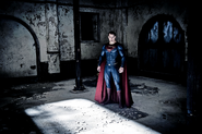 Superman stands in Wayne Manor