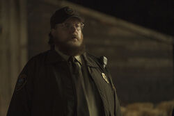 Economos confesses to dyeing his beard.