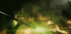 Superman stabs Doomsday with a Kryptonite spear