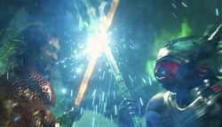 Aquaman and Black Manta on a Trident duel.