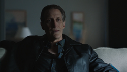 Locke talks to Murn about the operation