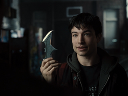 Barry holding Bruce's batarang (Zack Snyder's Justice League)