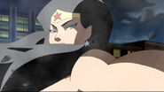 Wonder Woman tries to pull Flash back from the Speed Force.