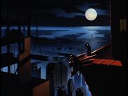 Batman and Robin survey Gotham.