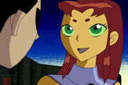 Starfire expresses joy at having Robin back.