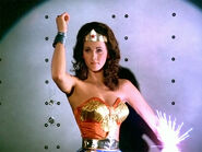 S1 e00e.jpg (66 KB) Wonder Woman deflecting bullets.