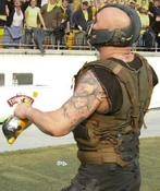 Tom Hardy as Bane, showing venom tubes.