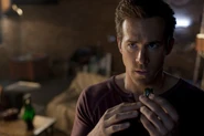 Hal Jordan putting the ring on.