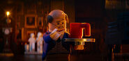 Alfred Pennyworth voiced by Ralph Fiennes in The LEGO Movie film series.