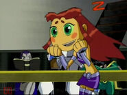 Starfire excitedly tries to guess what Beast Boy is saying.